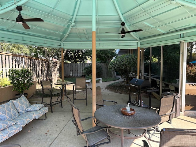 view of patio / terrace featuring grilling area and ceiling fan