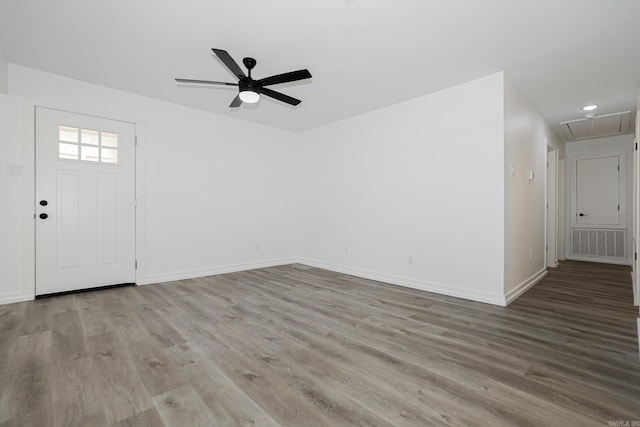 interior space with light hardwood / wood-style floors and ceiling fan