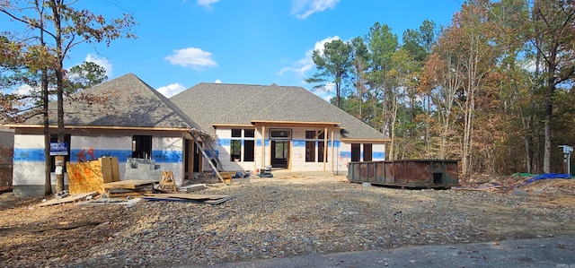 unfinished property featuring a hot tub