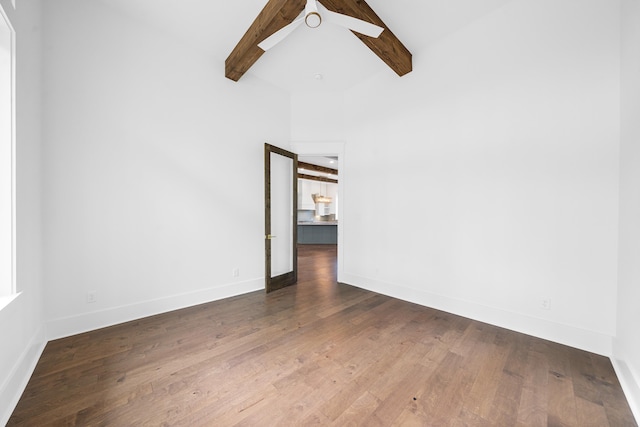 empty room featuring high vaulted ceiling, ceiling fan, dark hardwood / wood-style flooring, and beamed ceiling