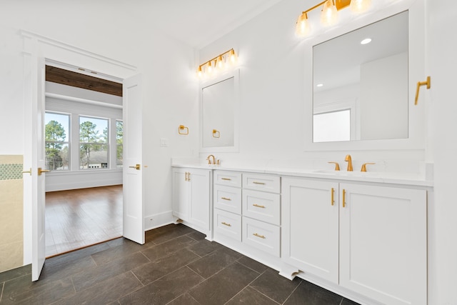 bathroom with vanity and tile patterned flooring