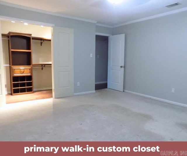 unfurnished bedroom featuring a closet and crown molding