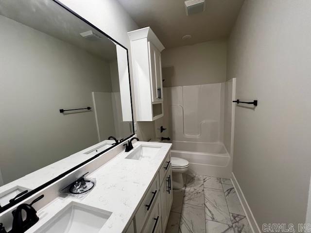 full bathroom with toilet, shower / tub combination, and vanity