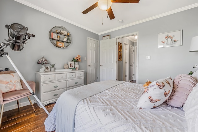 bedroom with crown molding, dark wood-type flooring, and ceiling fan