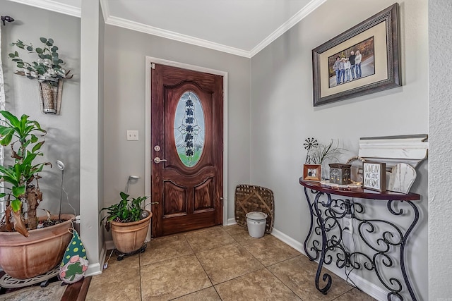 foyer entrance featuring crown molding and light tile patterned flooring