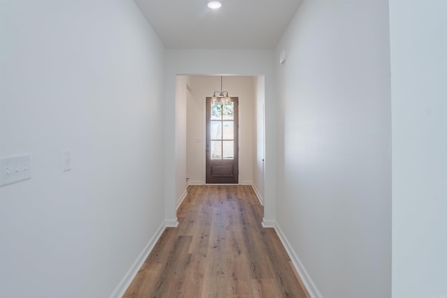 doorway to outside with light hardwood / wood-style flooring