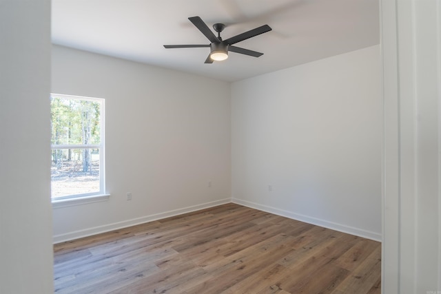 empty room featuring light hardwood / wood-style floors and ceiling fan