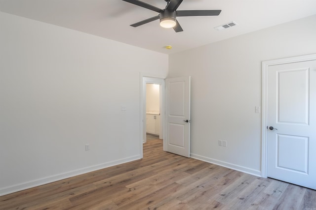 unfurnished bedroom featuring ceiling fan and light wood-type flooring