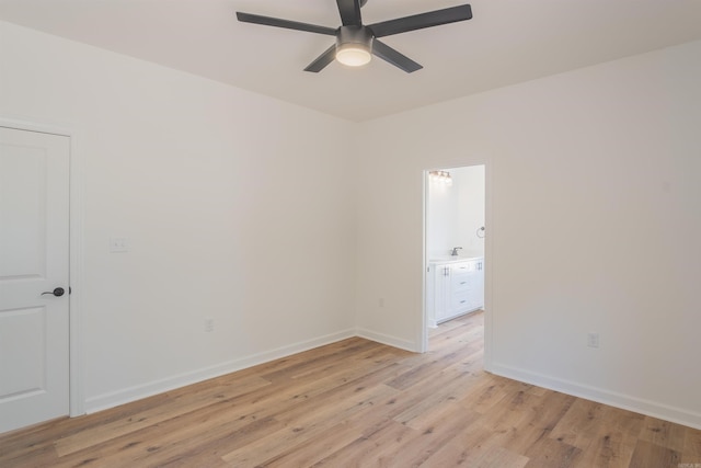 empty room featuring light hardwood / wood-style floors and ceiling fan