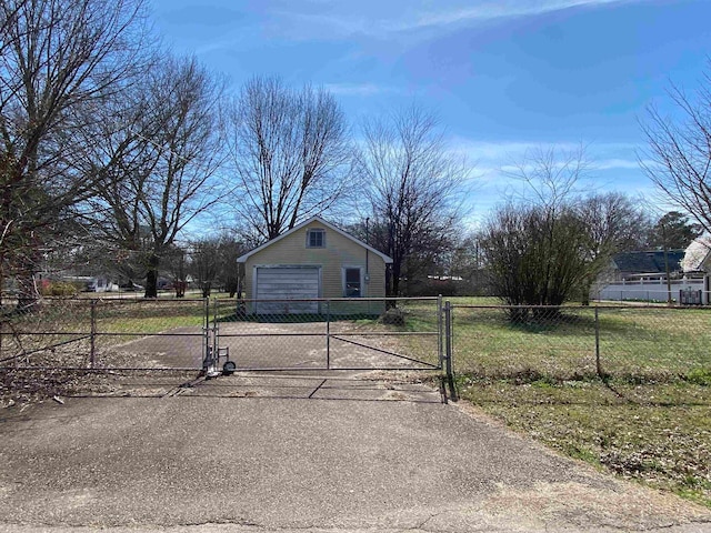 exterior space with an outdoor structure and a yard