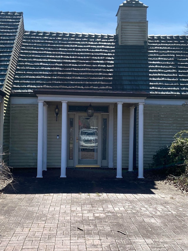 entrance to property with a porch