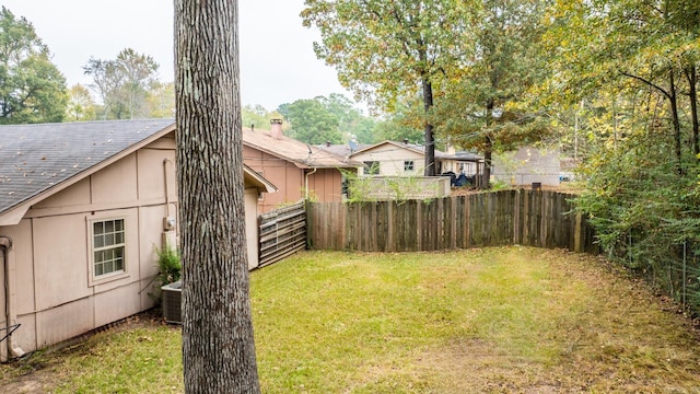 view of yard featuring central AC