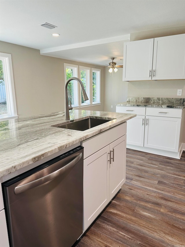 kitchen with dishwasher, white cabinets, dark wood-type flooring, and plenty of natural light