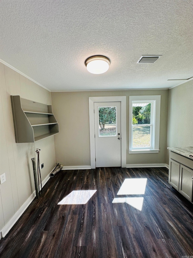 laundry area with washer hookup, a textured ceiling, and dark hardwood / wood-style flooring