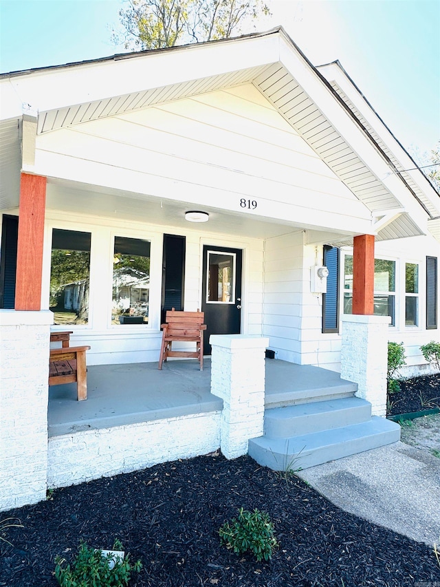 entrance to property with covered porch