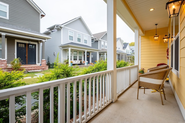 balcony featuring a porch