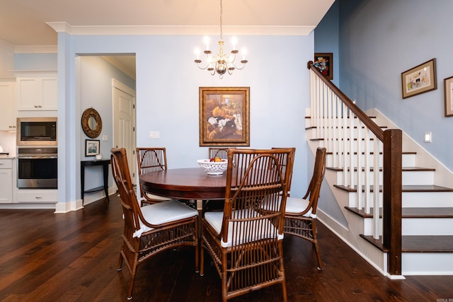 dining space with crown molding, a notable chandelier, and dark hardwood / wood-style flooring