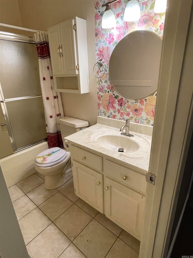 full bathroom featuring toilet, shower / tub combo, vanity, and tile patterned flooring