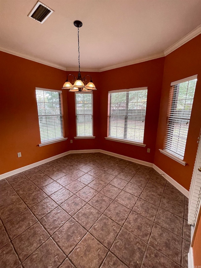 interior space with plenty of natural light, crown molding, and a notable chandelier