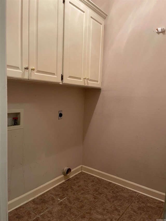 laundry room featuring cabinets, washer hookup, and hookup for an electric dryer