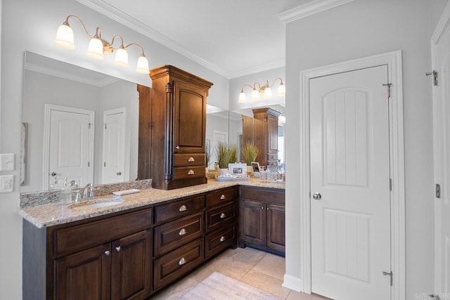 bathroom with vanity, tile patterned floors, and ornamental molding