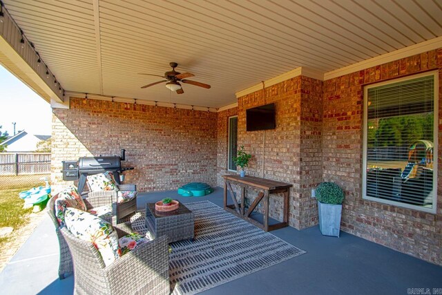 view of patio featuring outdoor lounge area and ceiling fan