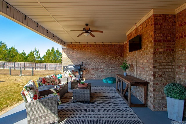 view of patio / terrace featuring ceiling fan, an outdoor hangout area, and a grill