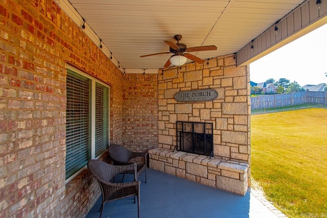 view of patio featuring ceiling fan