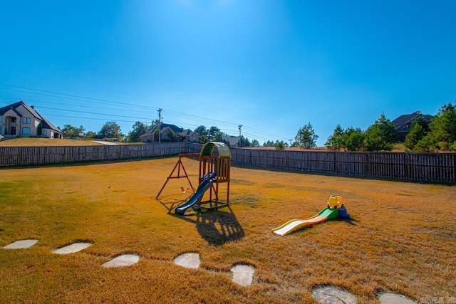 view of yard featuring a playground