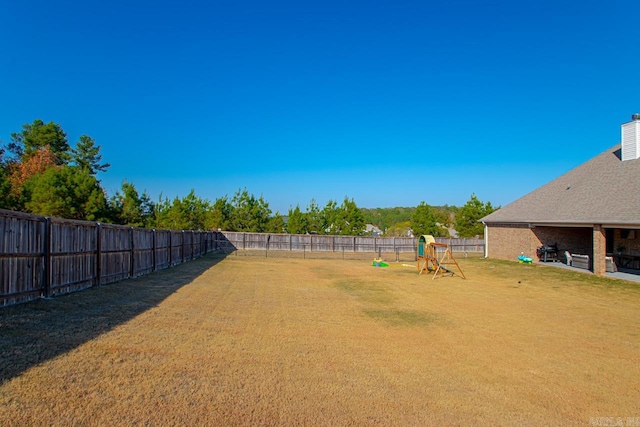 view of yard with a playground