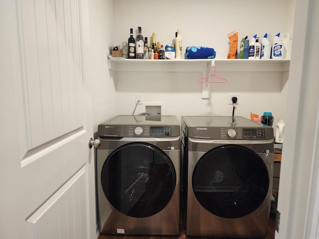 laundry area with washer and clothes dryer