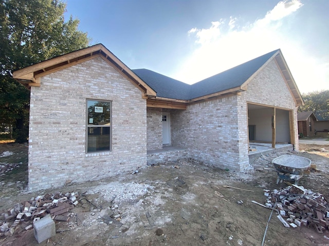 view of front of property with a patio