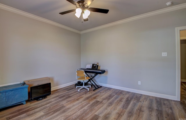 misc room featuring hardwood / wood-style flooring, ceiling fan, and ornamental molding