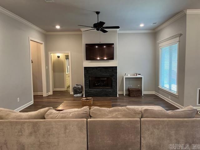 living room featuring wood-type flooring, ceiling fan, and crown molding