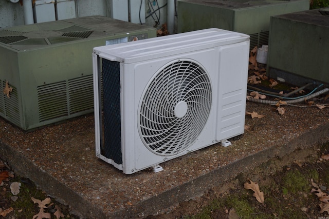 exterior details with cooling unit and ac unit