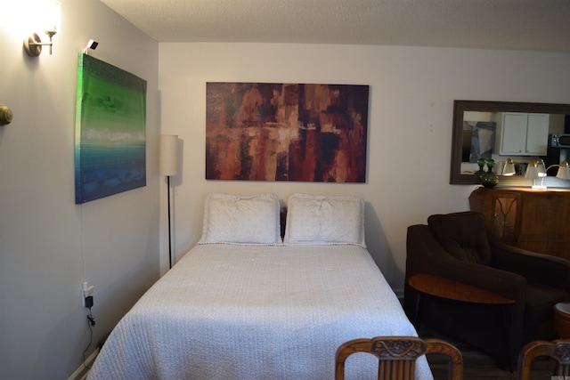 bedroom featuring a textured ceiling