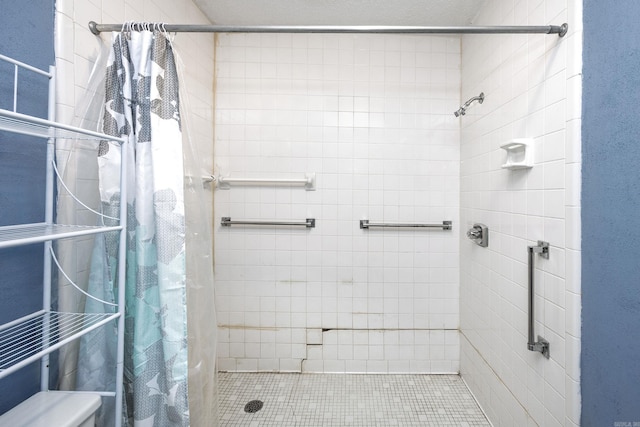 bathroom with tile patterned floors and a shower with curtain