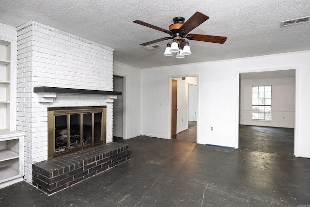 unfurnished living room featuring a brick fireplace, a textured ceiling, and ceiling fan