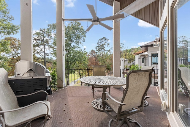 sunroom / solarium with ceiling fan