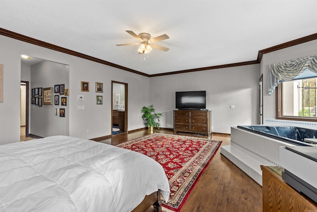 bedroom featuring ornamental molding, hardwood / wood-style flooring, and ceiling fan