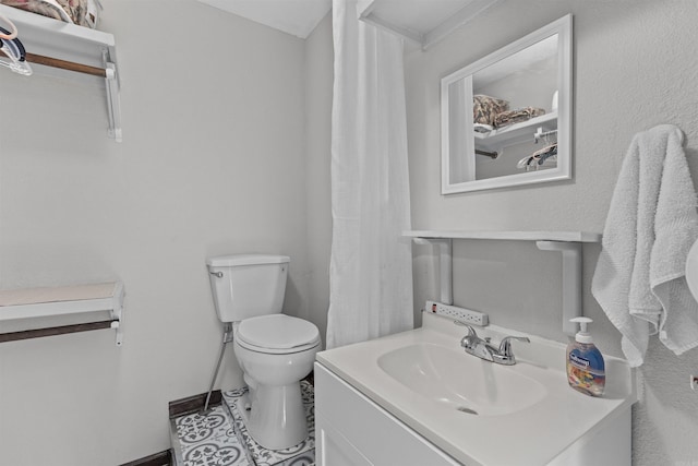 bathroom with vanity and toilet