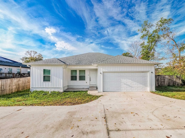 ranch-style home with a garage