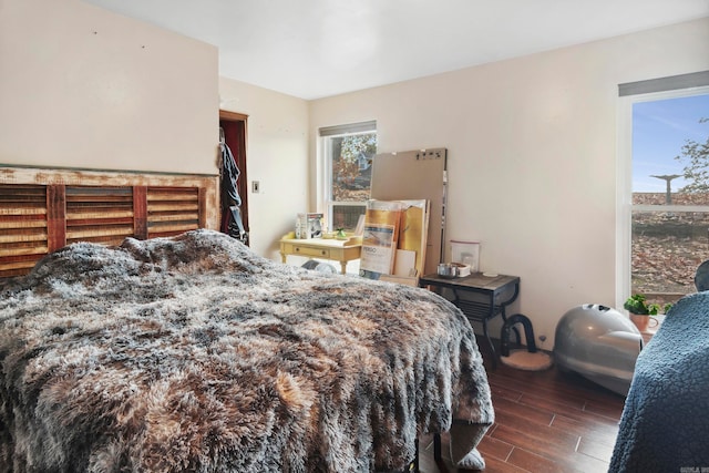 bedroom featuring dark hardwood / wood-style floors