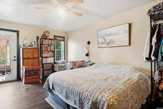 bedroom featuring dark hardwood / wood-style floors and ceiling fan