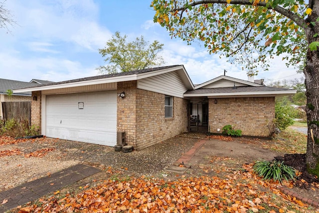 ranch-style home with a garage