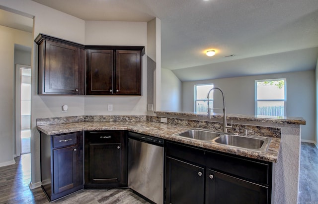 103 Harvest Dr, Beebe, AR 72012 - kitchen featuring stainless steel dishwasher, a sink, light wood finished floors, and a peninsula