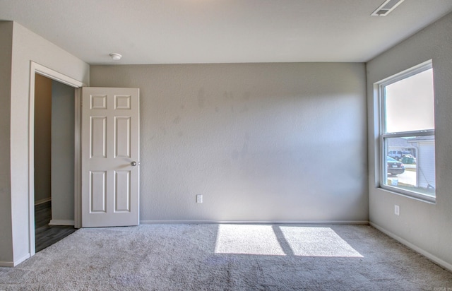 103 Harvest Dr, Beebe, AR 72012 - carpeted empty room with a smoke detector and baseboards