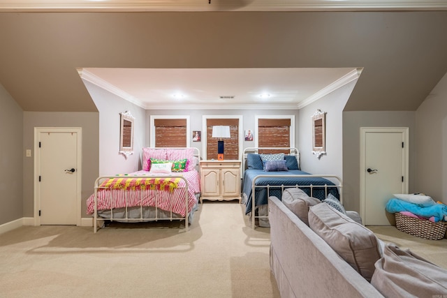 carpeted bedroom featuring crown molding