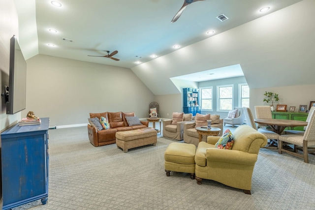 carpeted living room featuring lofted ceiling and ceiling fan