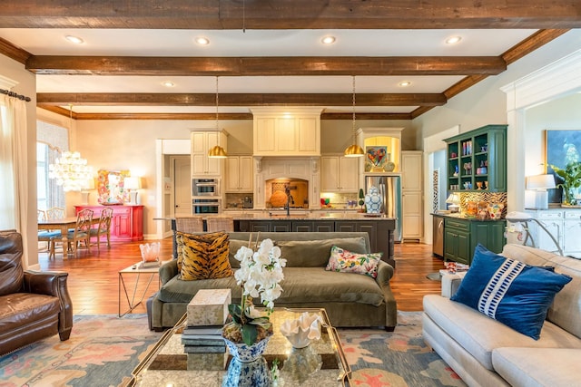 living room featuring hardwood / wood-style floors and beamed ceiling